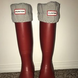 Tall red hunter boots with sweater boot socks